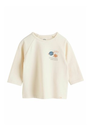 Crème-kleurig shirt met lange mouwen, voorzien van een grafiek van planeten en een ster. Gemaakt van zachte katoen met raglanmouwen en een ronde halslijn.