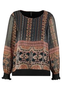Blusa trasparente e con un motivo che presenta una base scura con design intricati in ruggine, blu e oro. Maniche a sbuffo con un orlo nero solido.