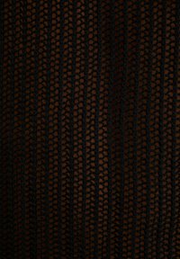 Black crochet fabric with vertical stripes, featuring an open weave pattern. The texture is lightweight and sheer, suitable for layering.