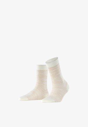 Paire de chaussettes beige et blanc chiné mi-mollet avec des bords côtelés, présentées verticalement sur un fond blanc.
