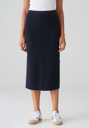 Knielanger, navyfarbener Bleistiftrock aus weichem Stoff mit taillierter Silhouette. Verfügt über einen hohen Bund und eine dezente Mittelnähten für zusätzliche Details.