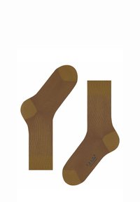 Brązowe prążkowane skarpetki z wzmocnionymi palcami i piętami. Gładka faktura z jednolitym wzorem i akcentami w dopasowanym odcieniu.