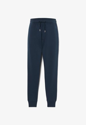 Navy blue joggers made of soft fabric, featuring an elastic waistband with drawstring, side pockets, and tapered cuffs.