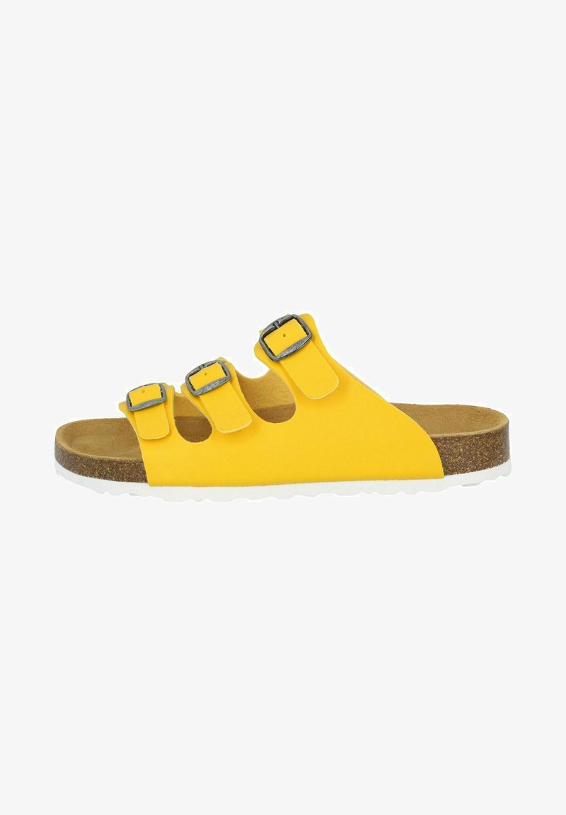Yellow sandal with three adjustable straps and silver buckles. Textured insole with cork detail, white rubber outsole, open design.