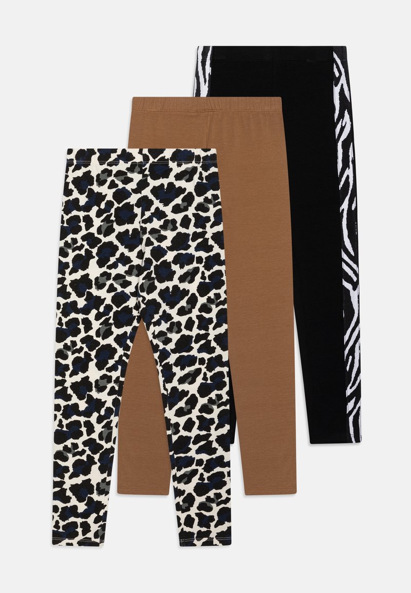 Trois paires de leggings : une avec un imprimé léopard noir et bleu, une en marron uni, et une en noir avec un détail rayé blanc de zèbre.