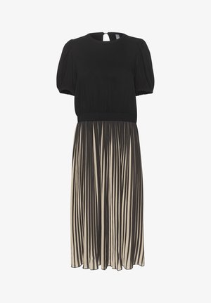 Black dress with short puff sleeves, a fitted waist, and a pleated cream skirt featuring black stripes. Back keyhole opening detail.
