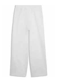 Άσπρο παντελόνι φόρμας με φαρδιά μπατζάκια και ελαστική μέση, απεικονίζεται επίπεδο σε λευκό φόντο.