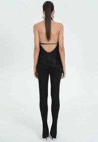 Mango ROMINE - Leggings - black