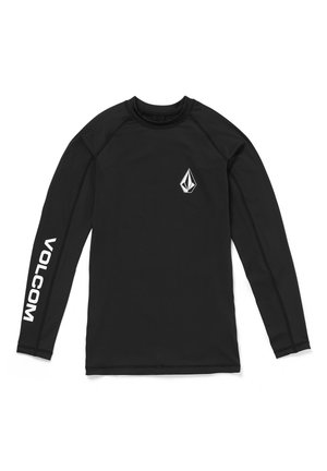 Rash guard noir à manches longues en tissu extensible. Présente un logo sur la poitrine et le texte "VOLCOM" sur la manche. Texture lisse.
