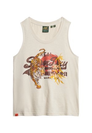 Débardeur couleur crème avec un graphique d'un tigre aux accents orange et du texte en rouge et noir. Fabriqué en tissu doux avec un col rond.