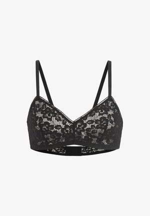 Sort blonde bralette med blomstermotiv, justerbare tynde stropper og en hægte-lukning på bagsiden.