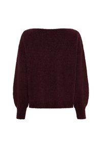 Burgundy oversized tröja med en mjuk, texturerad yta, bred ringning och ballongärmar. Ribbad fåll och nederkant fulländar designen.