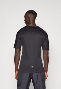 The North Face SUMMER LIGHTRANGE SUN PROTECTION - Sportfelső - black