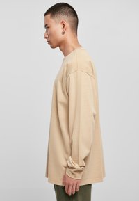 Urban Classics HEAVY OVERSIZED LONGSLEEVE - Bluză de molton - unionbeige