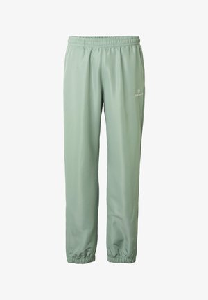 Lichtgroene sweatpants met elastische taille en enkels, voorzien van een klein wit logo op de rechterdij, gemaakt van gladde stof.