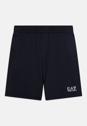 Pantaloni sportivi blu navy realizzati in materiale morbido, dotati di una vita elastica, tasche laterali e logo EA7 bianco sulla parte bassa della gamba sinistra.