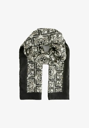 Schwarz-weißer, gemusterter Schal mit floralen Designs auf einem hellen Hintergrund und soliden schwarzen Rändern, hergestellt aus einem weichen, leichten Stoff.