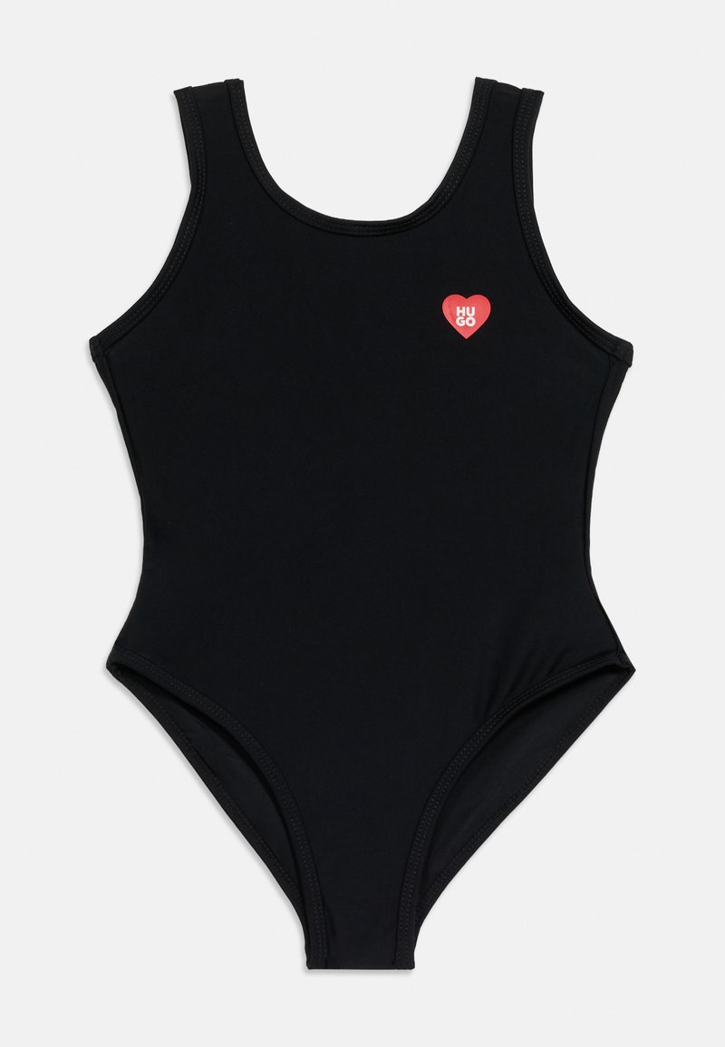 Μαύρο ολόσωμο μαγιό με φαρδιές τιράντες και μικρό κόκκινο καρδιά λογότυπο στο στήθος που γράφει "HUGO."