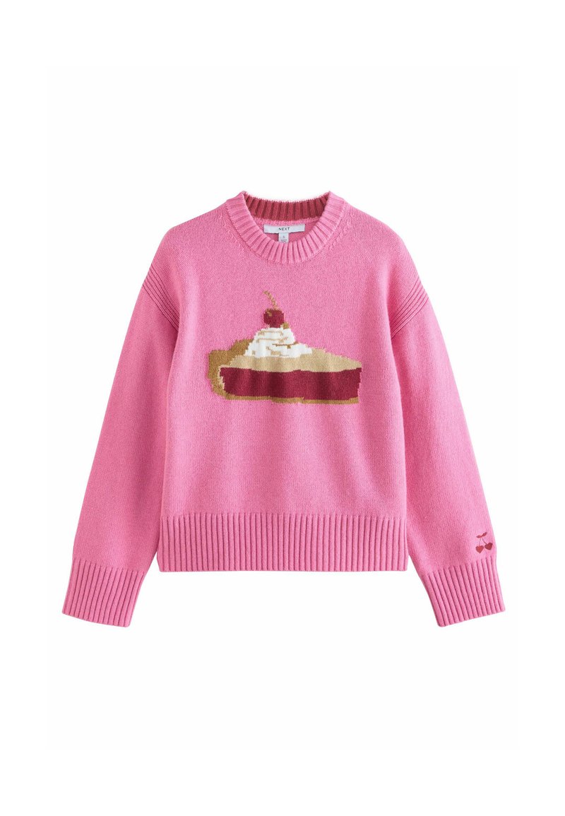 Maglione rosa lavorato a maglia con una grafica di torta decorata con panna montata e una ciliegina, polsini e orlo a coste, texture morbida e design giocoso.