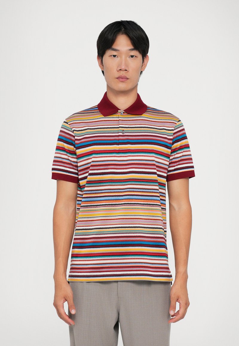 Polo con strisce orizzontali multicolore, colletto bordeaux e maniche corte, realizzato in un morbido tessuto a maglia.