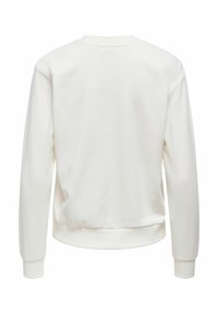 Sweat-shirt blanc à manches longues, col rond et poignets côtelés. Texture lisse et ourlet raccourci à l'arrière.