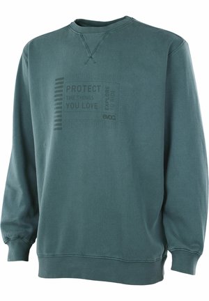 Grünes Sweatshirt mit Rundhalsausschnitt, gerippten Bündchen und Saum, mit einem verblassten Aufdruck mit dem Text „Schütze die Dinge, die du liebst“ und „Erkunde, um zu fahren.“