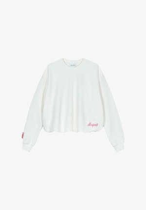 Fehér, rövidített pulcsi, puha anyagból készült, hosszú ujjakkal, bordás mandzsettákkal, rózsaszín hímzett szöveggel az elején és az ujján.