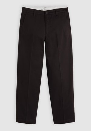 Black straight-leg chinos with belt loops, button closure, and side pockets, displayed on a light gray background.