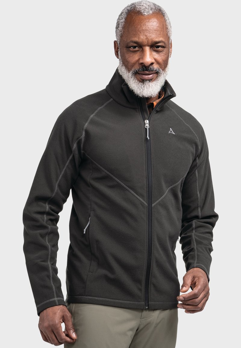 Schwarze Fleecejacke mit hohem Kragen und Reißverschlussfront. Merkmale sind kontrastierende Nähte und Seitentaschen, hergestellt aus einem strukturierten Stoff.