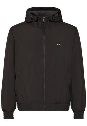 Μαύρο φούτερ με κουκούλα και φερμουάρ, με ελαστικά μανίκια και τελείωμα, με μικρό λευκό λογότυπο "cK" στο αριστερό στήθος.