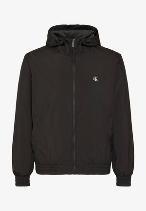 Μαύρο φούτερ με κουκούλα και φερμουάρ, με ελαστικά μανίκια και τελείωμα, με μικρό λευκό λογότυπο "cK" στο αριστερό στήθος.