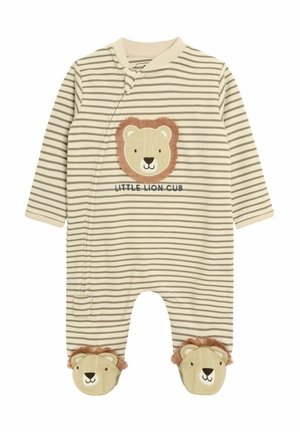 Salopetă bej cu dungi pentru bebeluși, cu mâneci lungi, având un patch cu fața unui leu și textul "Micuț Leu". Accente cu cap de leu pe tălpi.