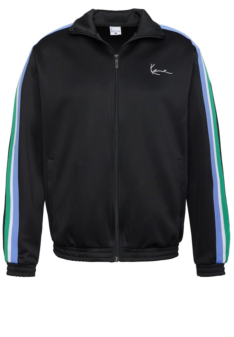 Melna rāvējslēdzēja jaka ar stāvu apkakli, uz piedurknēm zaļas, zilas un gaiši zilas svītras. Gluda tekstūra ar elastīgām aprocēm.