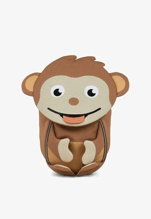 Brown monkey-shaped backpack made of fabric. Features large eyes, round ears, and an open mouth with a tongue. Includes defined paws and accents.