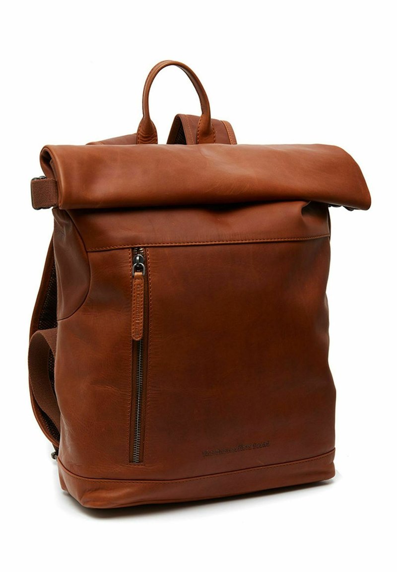 Brown leather backpack with a roll-top closure, front zip pocket, and adjustable straps. Smooth texture with a classic design.
