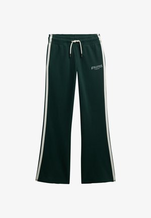 Pantaloni della tuta verdi con vita regolabile, strisce bianche sui lati e testo "ATHLETICS" stampato sul davanti. Tessuto morbido e design a gamba larga.