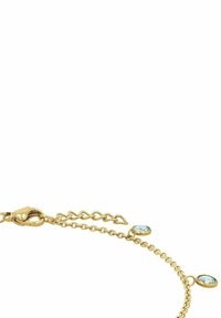 Pulsera en tono dorado con cadena ajustable, que presenta tres piedras ovaladas de color azul claro y un cierre de langosta. Textura de metal suave.