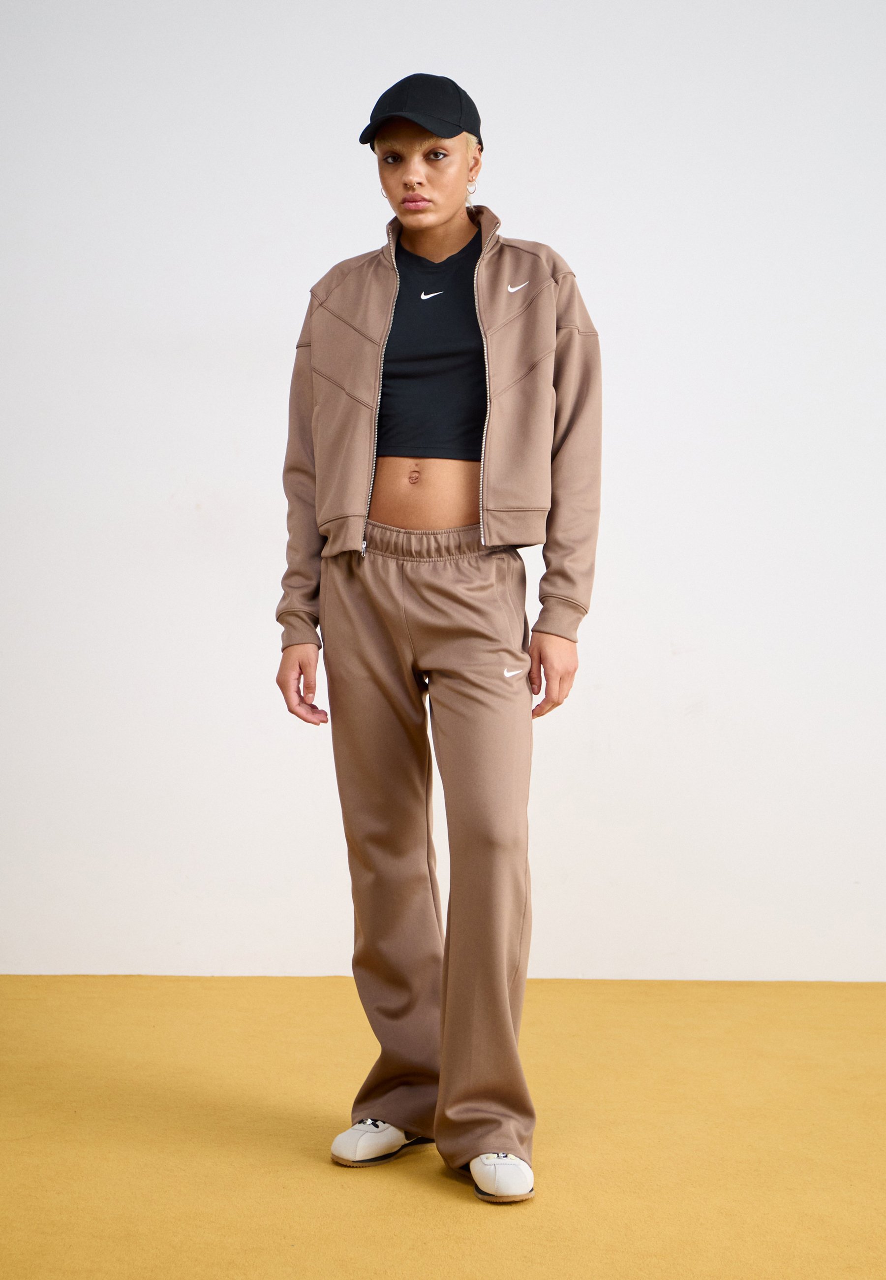 womens nike tracksuit brown
