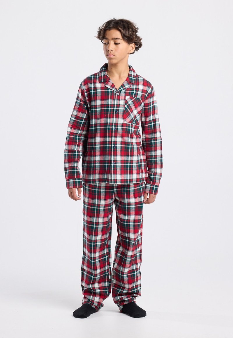 Red and green plaid pajamas with a button-up shirt featuring a chest pocket and long pants. Made of soft fabric, designed for comfort.