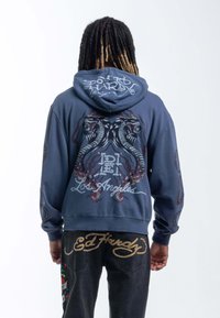 Navy blue hoodie with intricate graphics, featuring serpents in gray and red, and "Los Angeles" text. Ribbed cuffs and waistband.