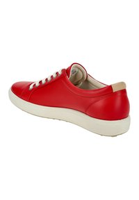 Red leather sneaker with white rubber sole, rounded toe, and lace-up design. Smooth texture with a subtle stitched detail at the back.