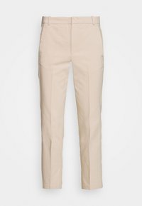 Beige skräddarsydda byxor med rak ben, slät textur, bred midjeband och sidofickor, med skarpa veck fram.