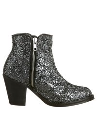 Bottine noire avec un talon épais, fermeture éclair sur le côté, et recouverte de paillettes argentées pour un effet scintillant.