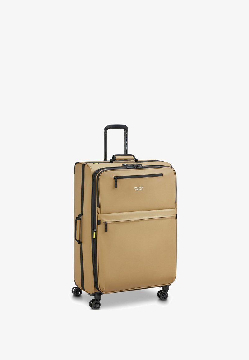 Valigia con ruote in tessuto beige, dotata di manico telescopico, cerniere nere, tasca frontale e quattro ruote nere per la mobilità.