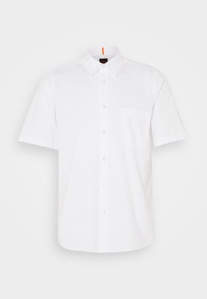 Hvit kortermet skjorte med knapper laget av bomull, med en enkelt brystlomme, klassisk krage og diskrete sømdetaljer.