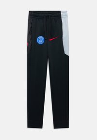 Pantalons de sport noirs avec des panneaux latéraux gris, le swoosh rouge de Nike et le logo bleu du Paris Saint-Germain sur la cuisse gauche, taille élastique avec cordon de serrage.