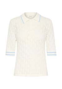 Krämfärgad kortärmad polo med ett spetsmönster, blå randiga manschetter och ståkrage. Har fem knappar längs placket.