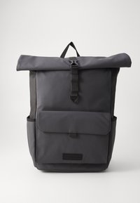Gray roll-top backpack with adjustable strap, front pocket, and dual side pockets, made of durable nylon material. Simple design with minimalist accents.
