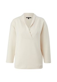 Pull à manches longues couleur crème avec un col en V profond et un col, présentant une coupe décontractée et une texture de tissu lisse.