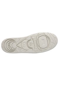Schuhsohle aus weißem Gummi mit runden und ovalen Mustern, strukturierten Griff-Elementen und einem zentralen runden Emblem mit einem Sterndesign.